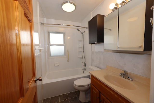 full bathroom with toilet, vanity,  shower combination, and tile patterned flooring