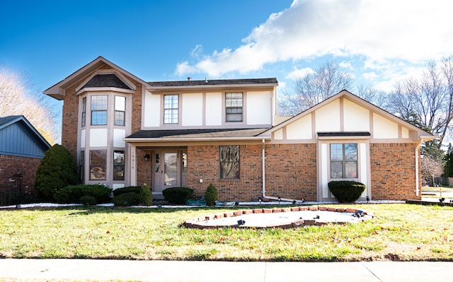 view of front of home featuring a front yard