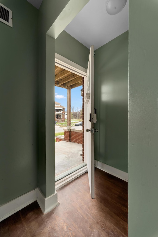 doorway featuring hardwood / wood-style floors