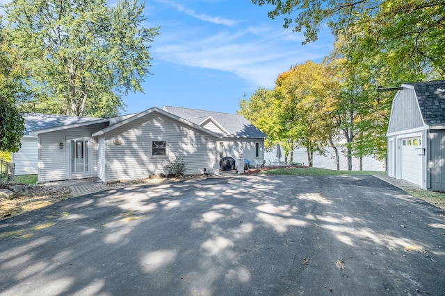 view of property exterior featuring a garage