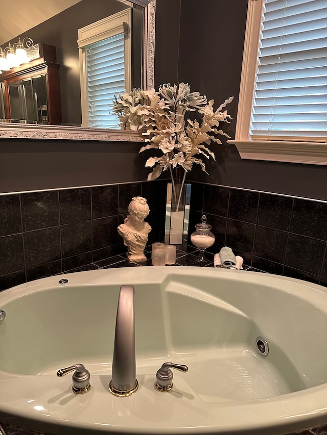 bathroom featuring a tub to relax in