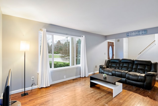 living room featuring light wood-type flooring