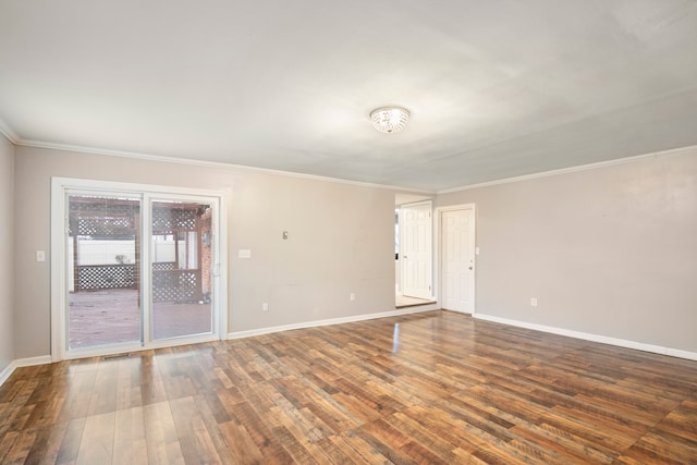 unfurnished room with dark hardwood / wood-style flooring and ornamental molding