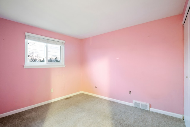 empty room with carpet floors