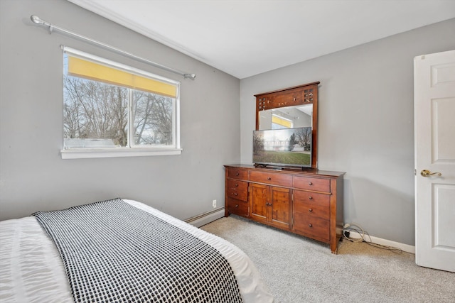 carpeted bedroom featuring a baseboard radiator