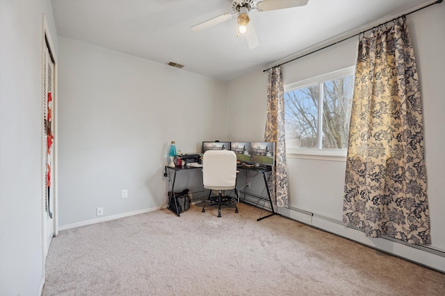 unfurnished office featuring carpet flooring, baseboard heating, and ceiling fan