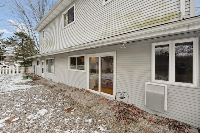 view of snow covered property