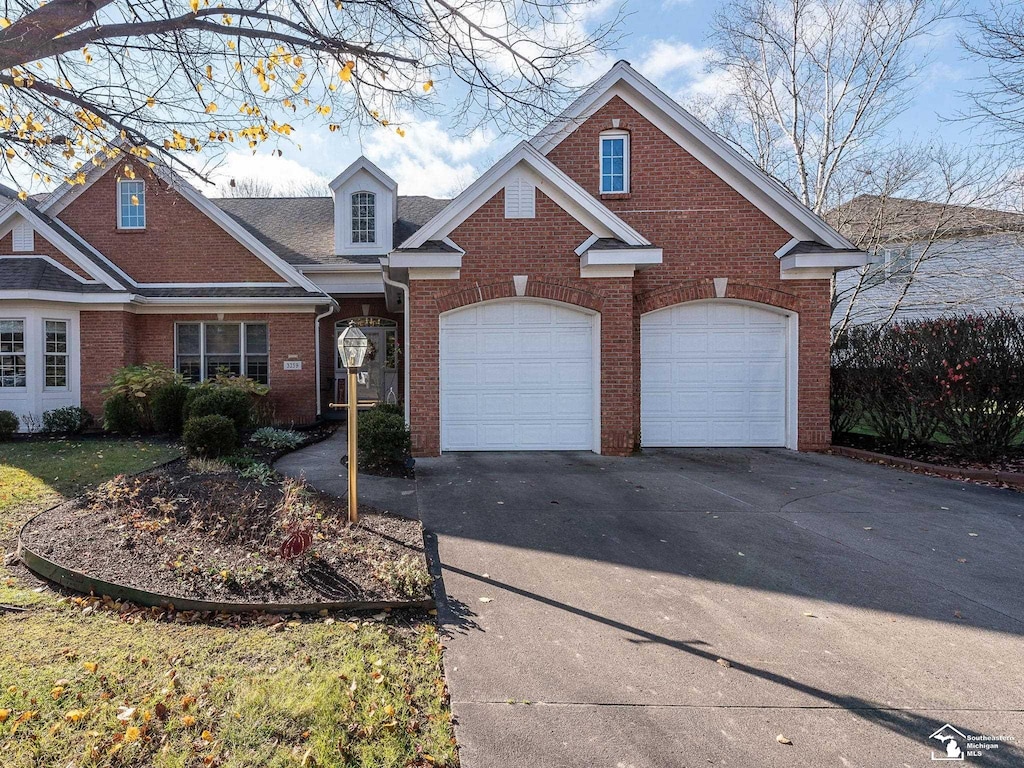 view of front of property with a garage