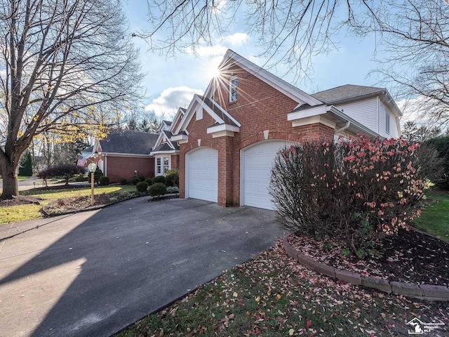 view of property exterior with a garage