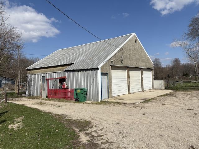 detached garage with fence