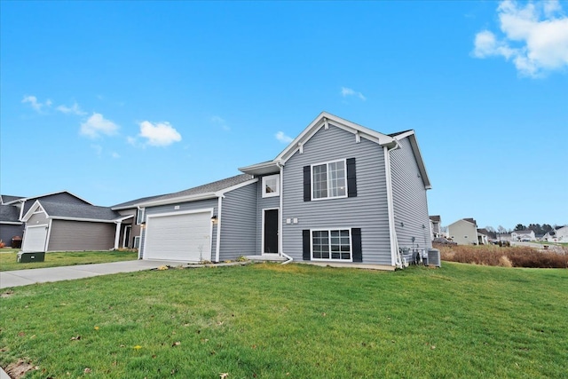 view of front of property featuring central AC unit, a garage, and a front lawn