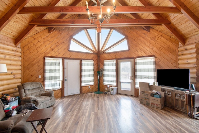 living room with hardwood / wood-style flooring, wood ceiling, beamed ceiling, and high vaulted ceiling