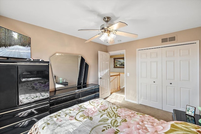 bedroom with light carpet, a closet, and ceiling fan