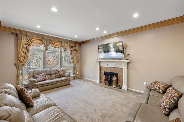 living room with crown molding, a fireplace, and light colored carpet