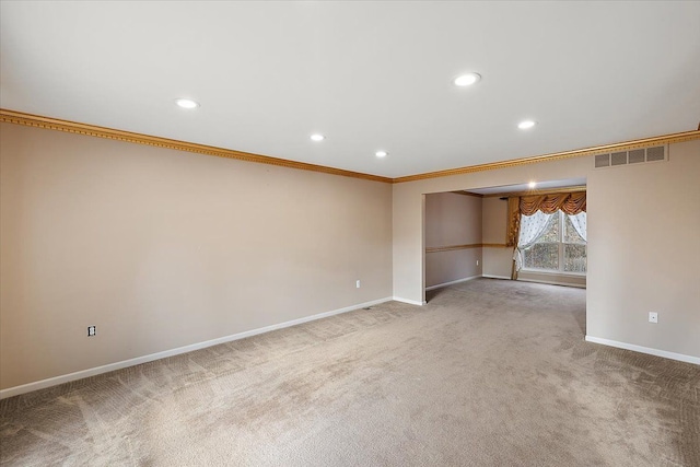 spare room with carpet flooring and ornamental molding