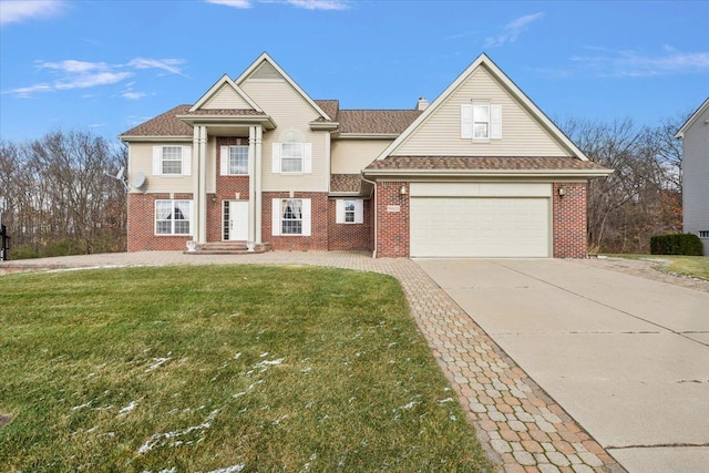 view of front facade featuring a front lawn and a garage