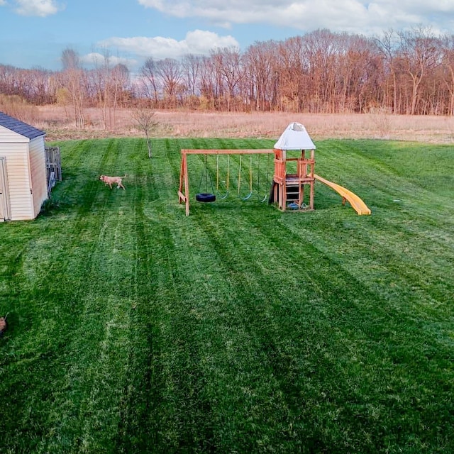 view of yard with a playground