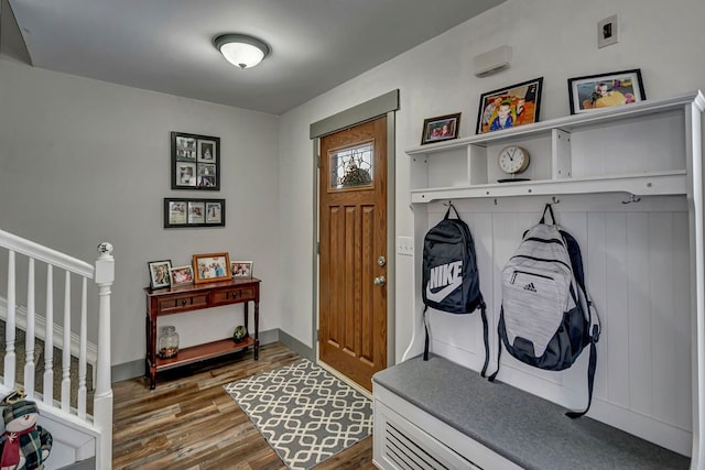 mudroom with dark hardwood / wood-style flooring