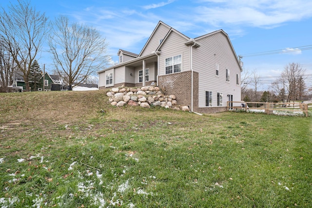 view of home's exterior featuring a lawn