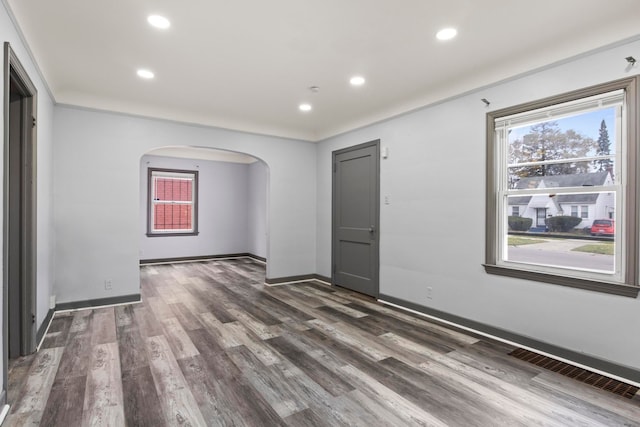 empty room featuring dark wood-type flooring