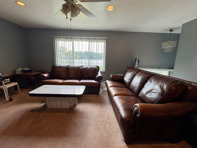 living room with carpet floors and ceiling fan