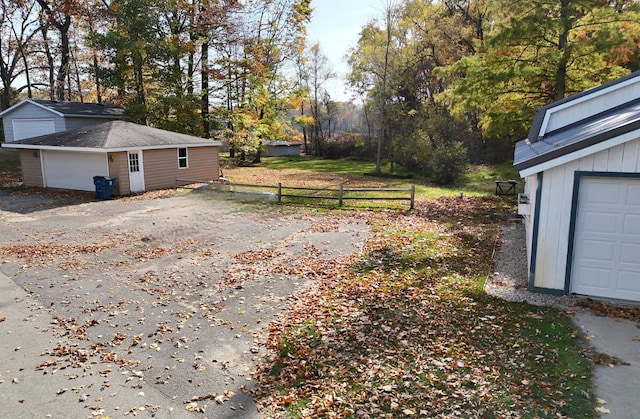 view of yard featuring a garage