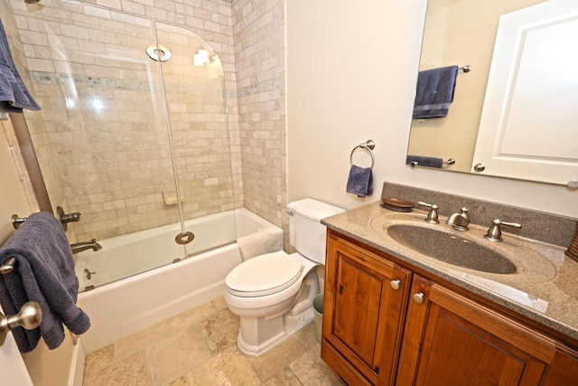 full bathroom featuring vanity, toilet, and enclosed tub / shower combo