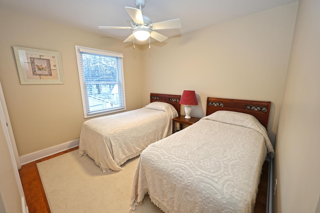 bedroom featuring ceiling fan and hardwood / wood-style floors