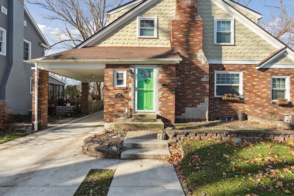 view of front of property with a carport