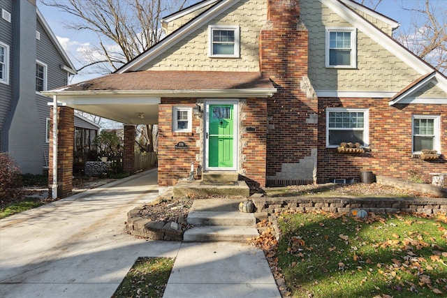 view of front of property with a carport