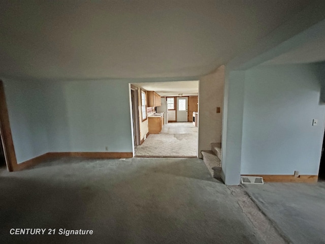 spare room with light colored carpet