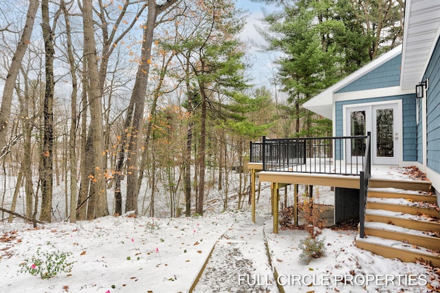 view of snow covered deck