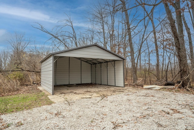 view of outbuilding featuring a carport