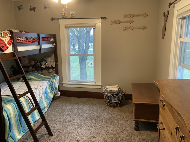 bedroom featuring carpet