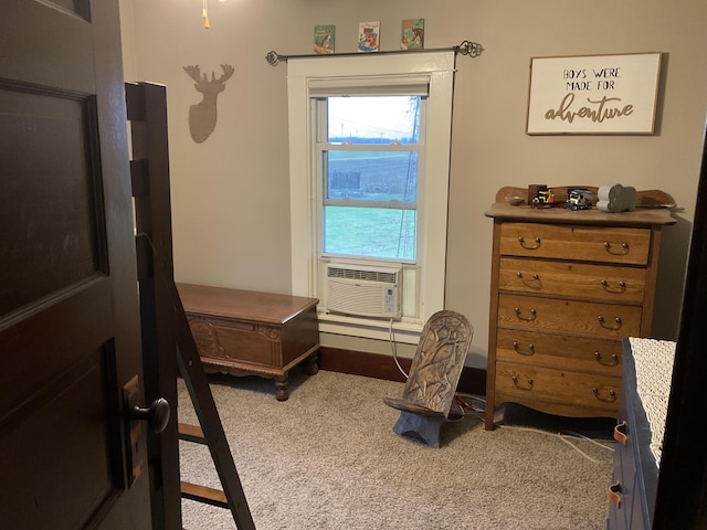 bedroom with cooling unit and carpet