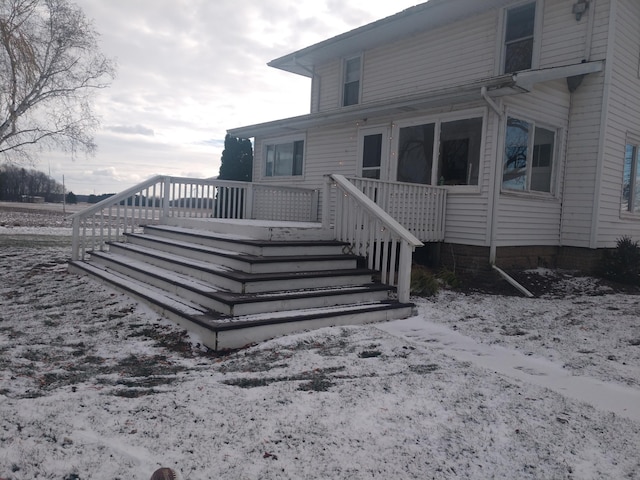 rear view of property with a deck