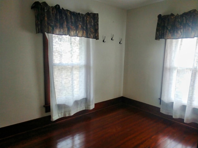 empty room featuring hardwood / wood-style floors