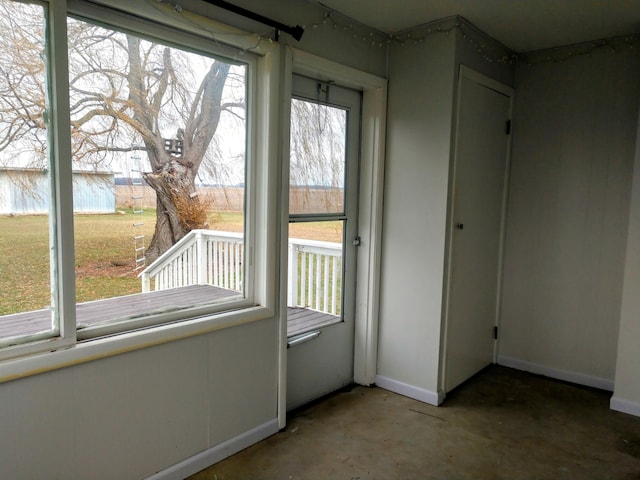 doorway featuring concrete flooring