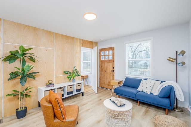 living room with light hardwood / wood-style flooring