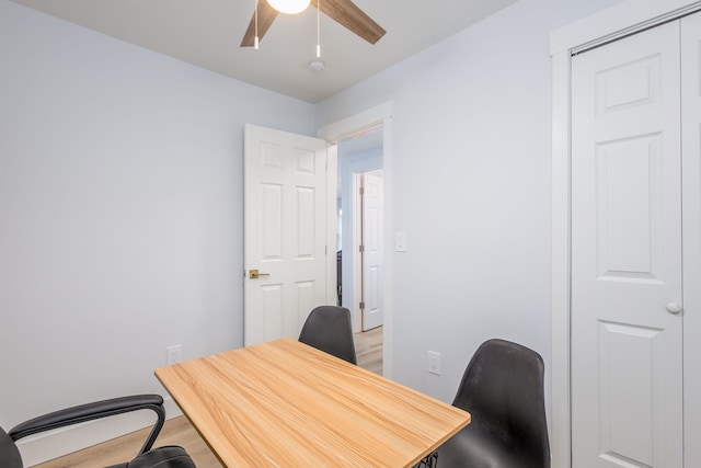 office space with ceiling fan and hardwood / wood-style flooring