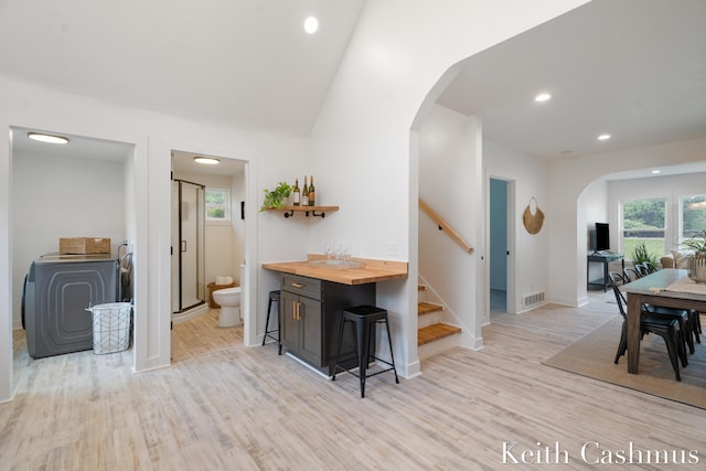 17513 M 140th Hwy, South Haven, MI 49090 - kitchen with wooden counters, arched walkways, light wood-style flooring, recessed lighting, and baseboards