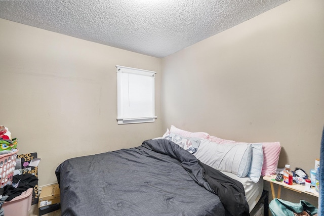 bedroom with a textured ceiling