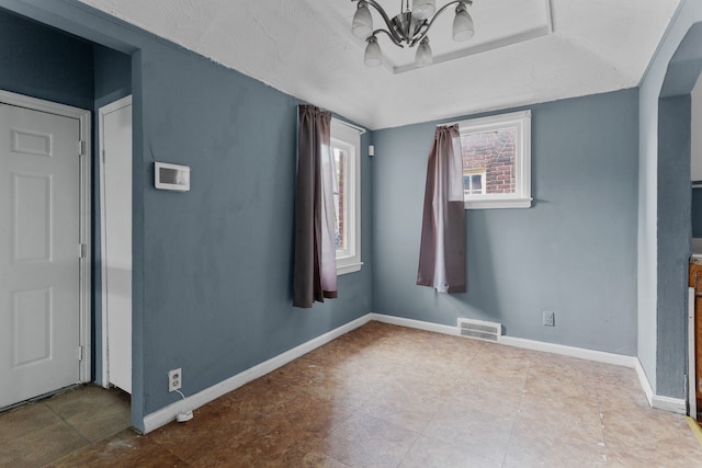 interior space with an inviting chandelier