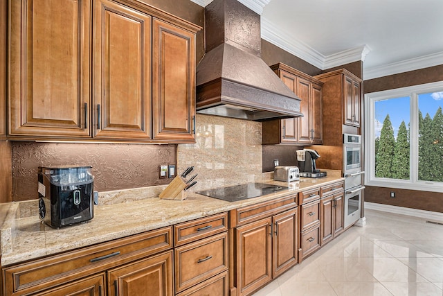 kitchen featuring stainless steel oven, premium range hood, black electric stovetop, oven, and ornamental molding