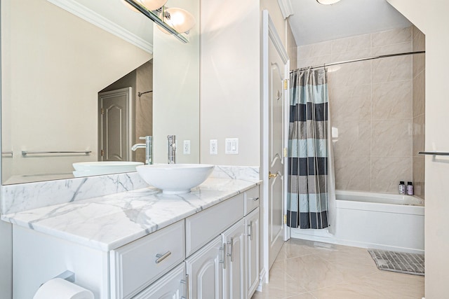 bathroom with crown molding, vanity, and shower / bath combo