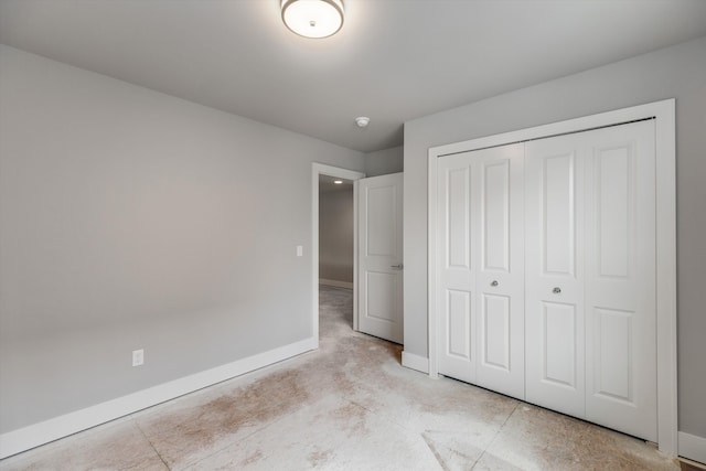 unfurnished bedroom featuring a closet