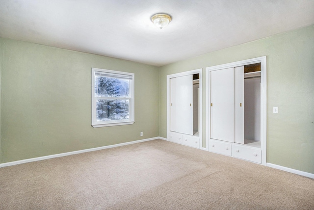 unfurnished bedroom featuring carpet floors