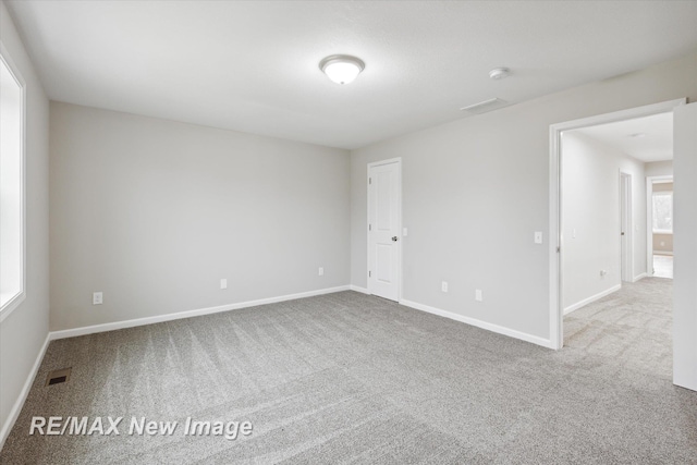 view of carpeted spare room