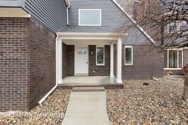 60 Golfview Dr, Saginaw, MI 48638 - property entrance featuring brick siding