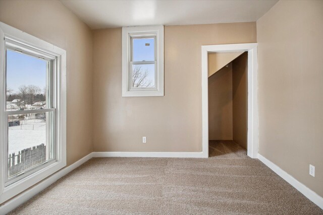 view of carpeted spare room